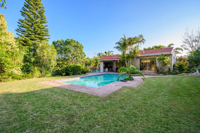 Spacious Sunridge Park house with pool, braai area, and guest suite for sale.