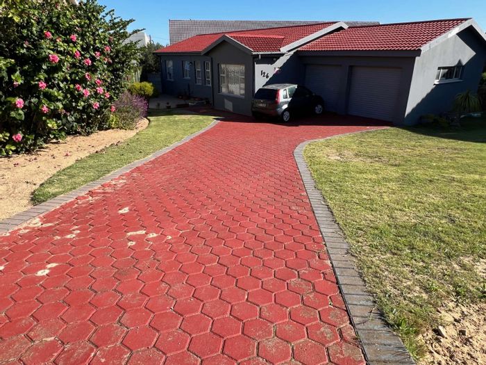 For Sale: House in Dana Bay with 3 Bedrooms, Study, Garages, and Garden.