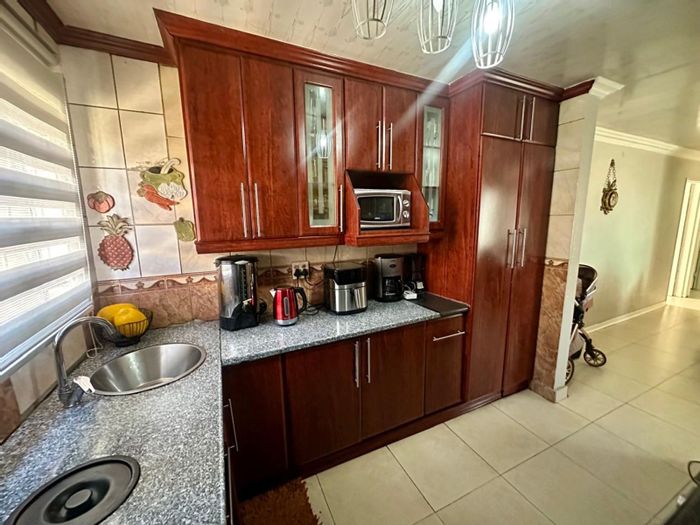 3-Bedroom House For Sale in Embalenhle with Garage, Spacious Yard, and Customization Potential.