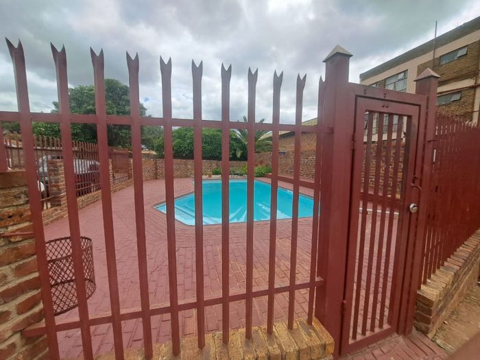 2-Bedroom Apartment To Rent in Silverton with pool, braai area, and security.