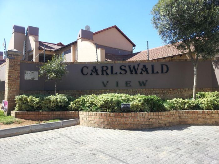 For Sale: Noordwyk Townhouse with clubhouse, pool, garden, and security features.