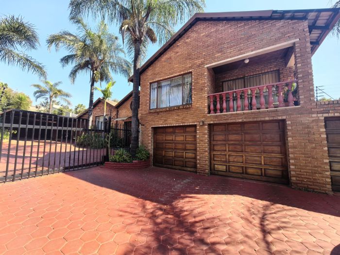 Versatile Zwartkop house for sale: 8 bedrooms, garden cottage, secure location.