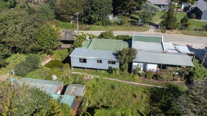 Farm For Sale in Wilderness Heights: Business rights, mountain views, and ample land.