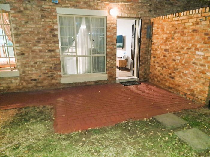 1-Bedroom Apartment For Sale in Newmark Estate with private garden and clubhouse amenities.