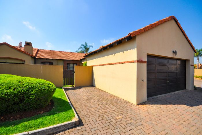 For Sale: Moreleta Park Townhouse with clubhouse, pool, tennis court, and double garage.