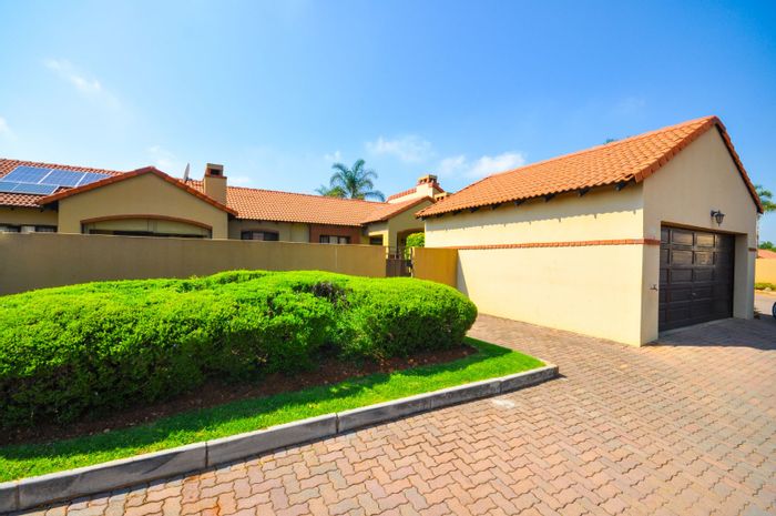 For Sale: Moreleta Park Townhouse with tennis court, clubhouse, pool, and double garage.