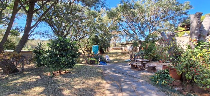 Rustenburg Rural Farm For Sale: Off-grid, solar-powered with abundant water and fruit trees.
