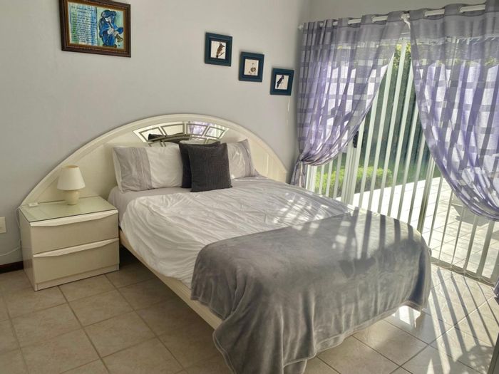 Furnished apartment in Myburgh Park with utilities included, secure parking, and laundry.