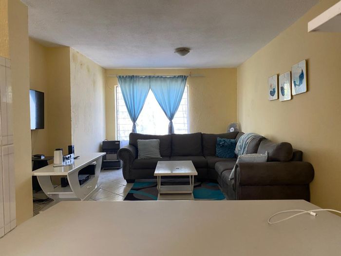 For Sale: 2-Bedroom Apartment in Primrose with Private Patio and Secure Parking.