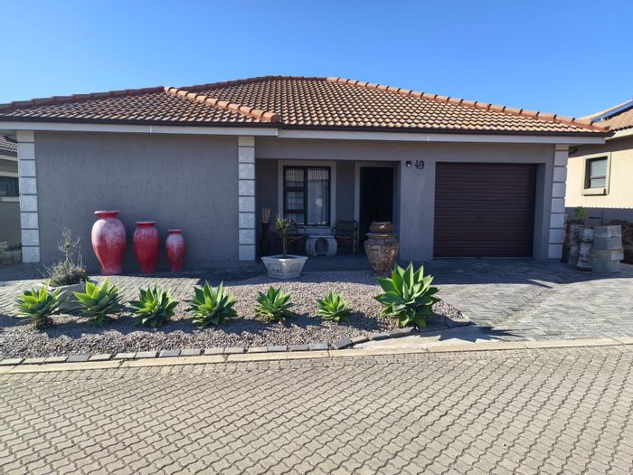 For Sale: 2-Bedroom Townhouse in Dana Bay with pool and secure estate access.
