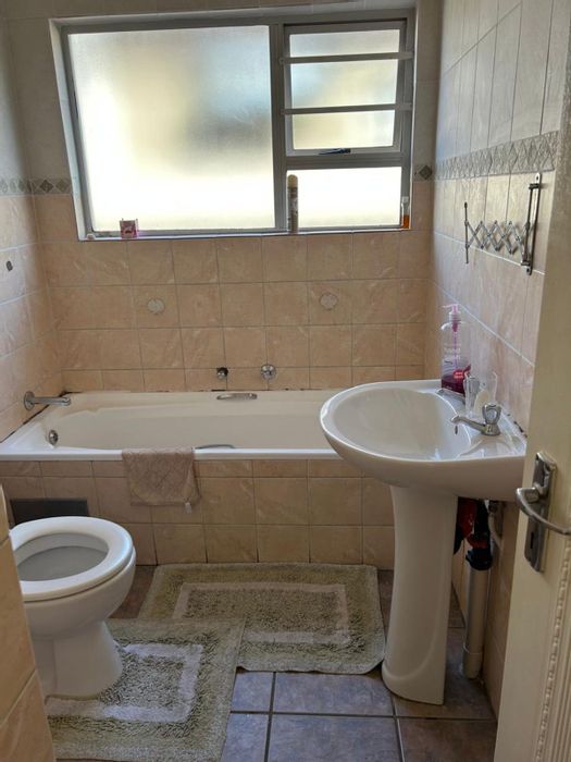 3-Bedroom Townhouse in Birchleigh with security, garden, and 2 garages for sale.