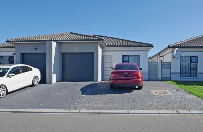 3-Bedroom House For Sale in Parklands with garden, parking, and en-suite master.