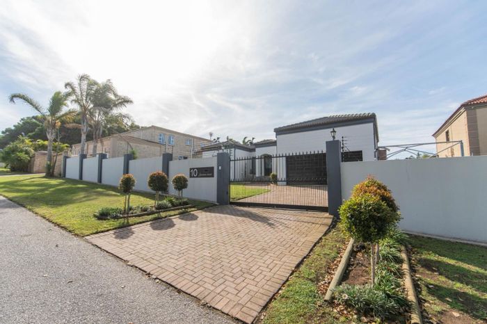 For Sale: Spacious 4-bedroom house in Sunridge Park with entertainment room and garden.
