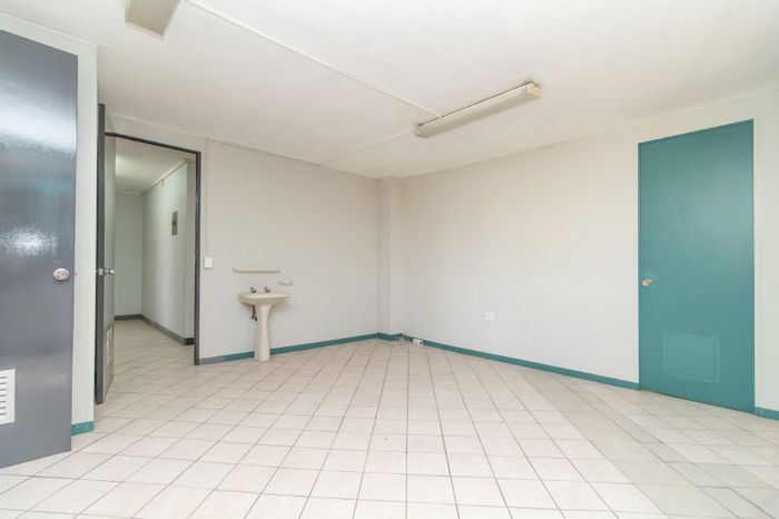 For Sale: Versatile Office Space in Bergbron with ample parking and security features.