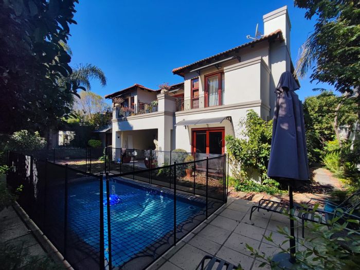 For Sale: House in Woodmead with 5 bedrooms, clubhouse, tennis courts, and staff quarters.