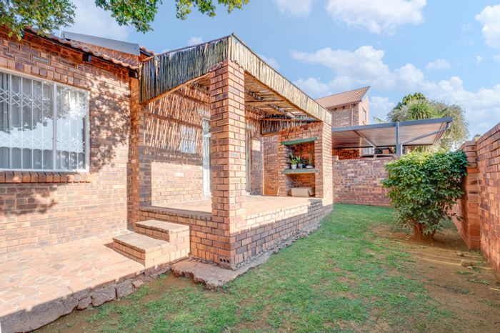 For Sale: Versatile townhouse in Weltevreden Park with private garden and secure complex.