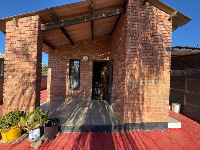 Roodepan House For Sale: 2 bedrooms, spacious yard, secure fencing, ample parking.