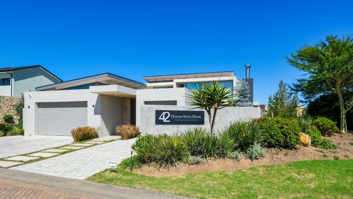 Oubaai House For Sale: 4 bedrooms, home theater, smart tech, outdoor entertainment.