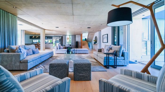 Oubaai House For Sale: 4 bedrooms, home theater, smart tech, outdoor entertainment.