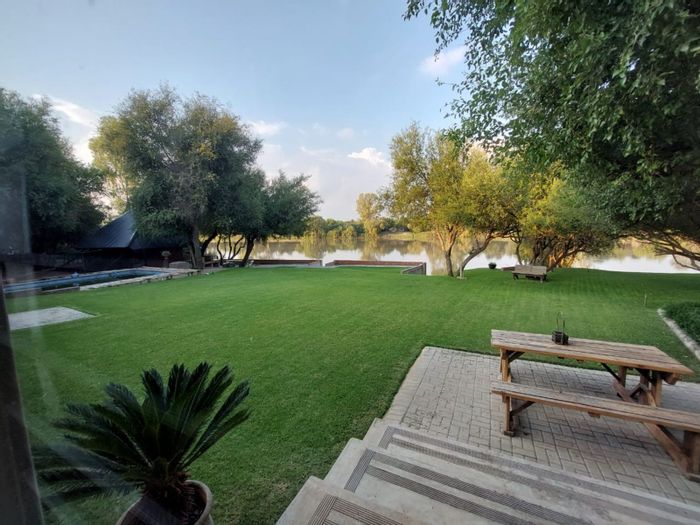 House for Sale in Bothaville Central: 5 bedrooms, flatlet, solar power, riverfront access.
