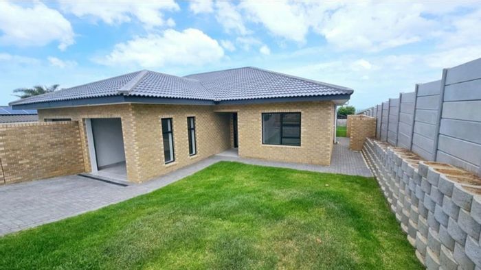 For Sale: House in Dana Bay with 3 bedrooms, garage, and landscaped yard.