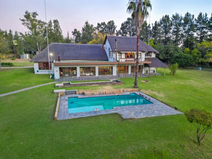 Lammermoor Farm For Sale: 5 beds, horse stables, cottage, generator, and koi pond.