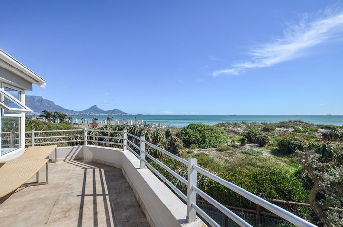 For Sale: Beachfront Townhouse on Woodbridge Island with 24-hour security and direct beach access.