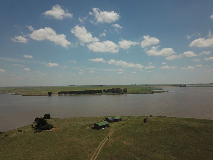 For Sale: Farm in Standerton Rural with dam access, mining potential, and grazing land.