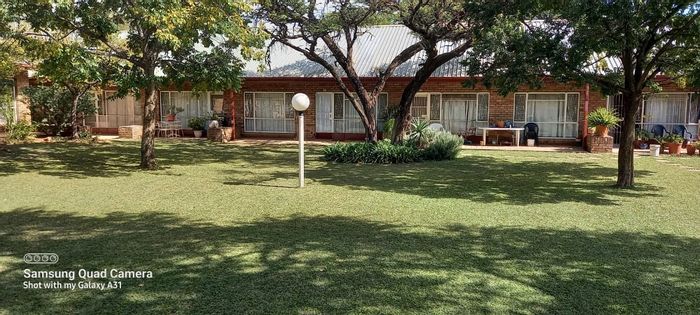 For Sale: Apartment Complex in Jan Kempdorp Central with 22 units, rental income R78,000.