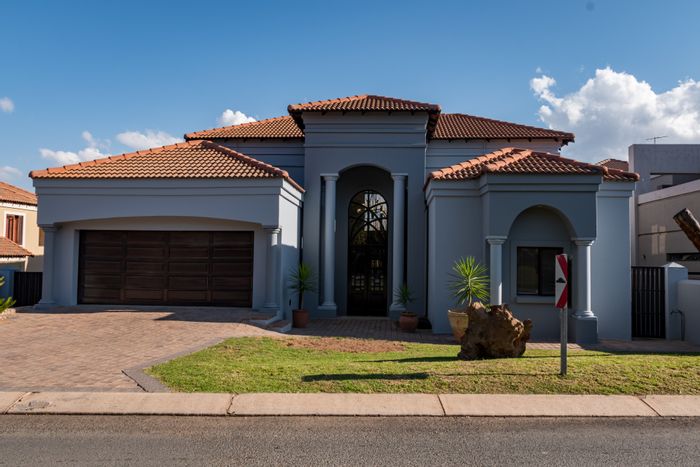 For Sale: House in Blue Valley Golf Estate with solar, spacious living, and amenities.