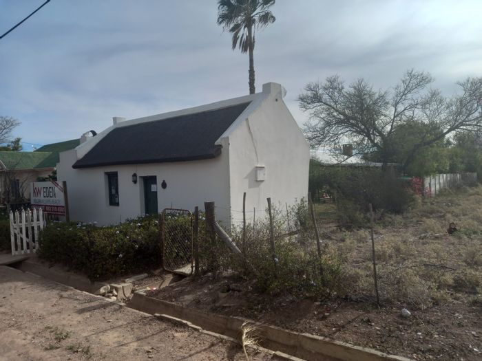 Heritage office building in Ladismith Central, potential rental income, for sale.