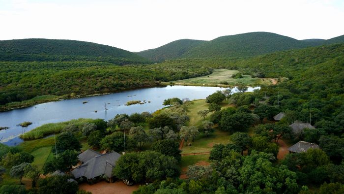 Vaalwater Central Farm For Sale: Game farm with accommodation, water, and diverse wildlife.