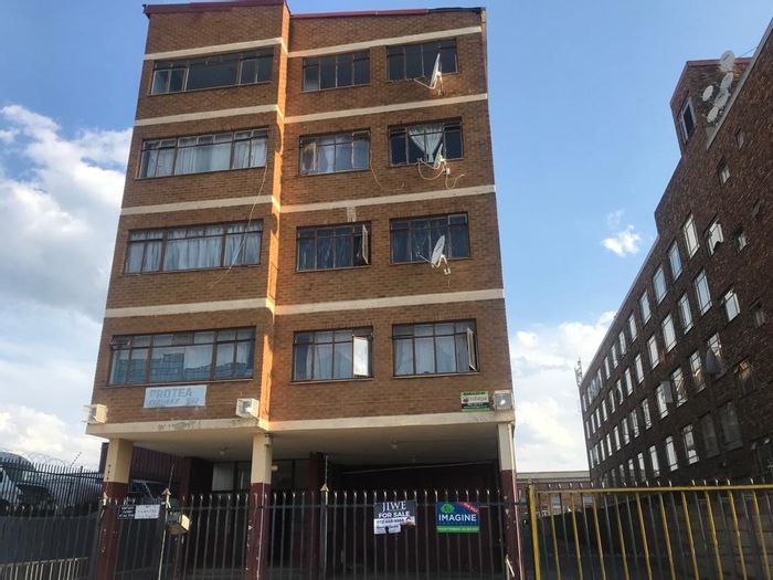 For Sale: Spacious 1-Bedroom Apartment in Pretoria West with rental potential.