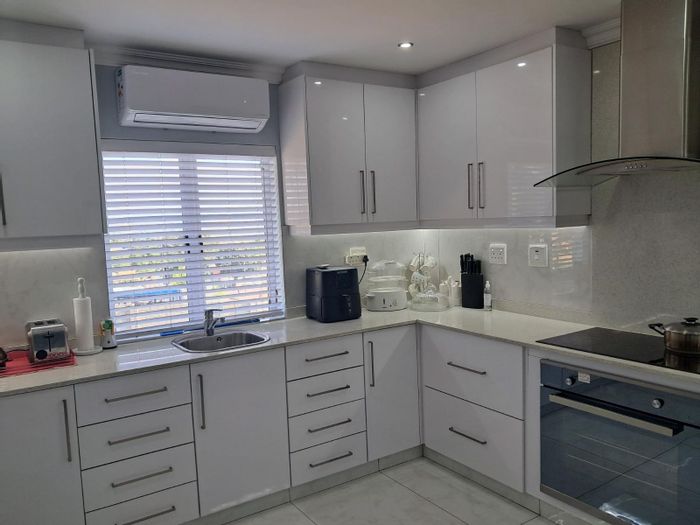 Versatile house in Greenwood Park for sale, featuring two homes and ample amenities.