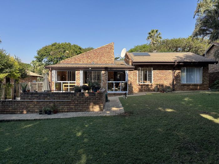 For Sale: House in West Acres Ext 13 with 4 beds, garden, and security features.