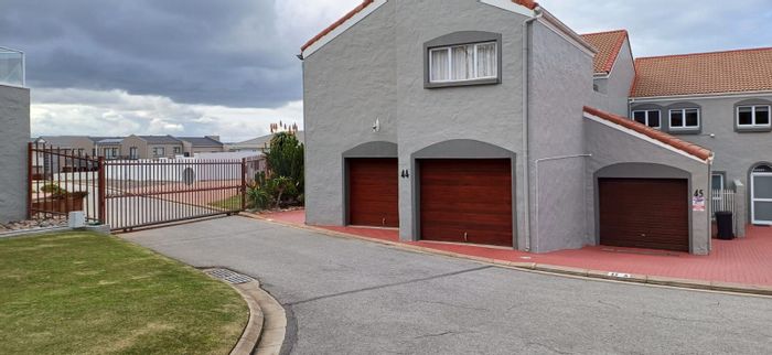 For Sale: Bayview Townhouse with beach access, 5 bedrooms, and double garage.