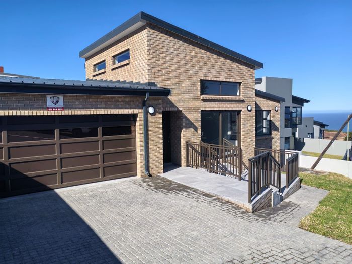 For Sale: House in Dana Bay with 3 bedrooms, indoor braai, and double garage.