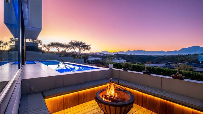 Oubaai House For Sale: Luxury living with pool, braai room, and mountain views.