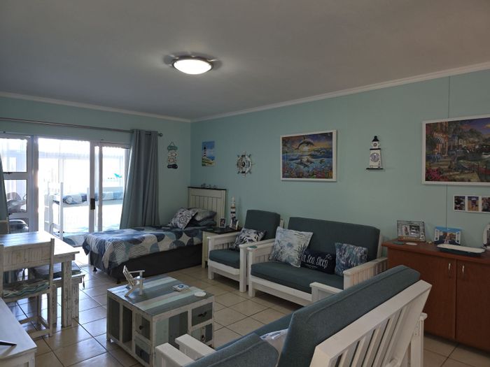 For Sale: Diaz Beach Apartment with 2 bedrooms, garden, pool, and inverter system.