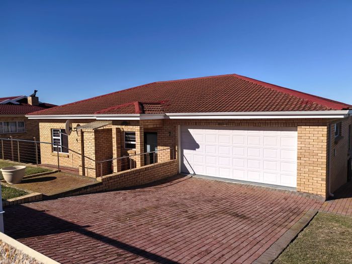 For Sale: House in Dana Bay with ocean views, 3 bedrooms, and spacious yard.