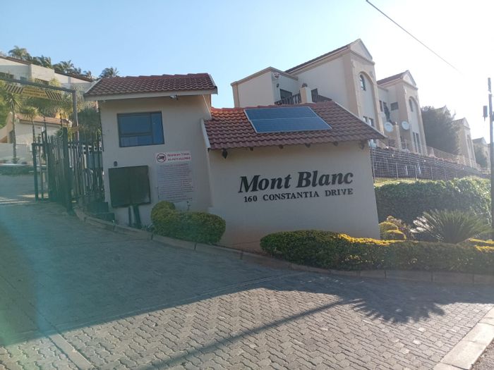 For Sale: 2-Bedroom Apartment in Constantia Kloof with Private Garden and Security.
