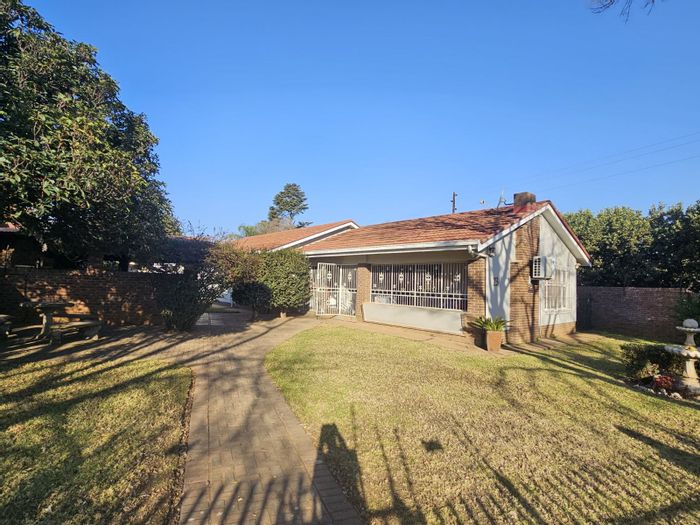 For Sale: Versatile house in Lydenburg Central with 5 bedrooms, security, and business potential.