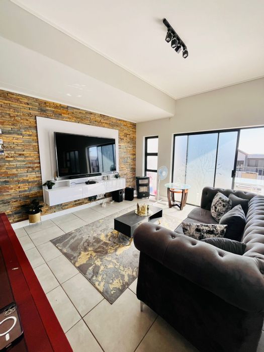 For Sale: 2 Bed Apartment in Waterfall with lagoon access and estate amenities.