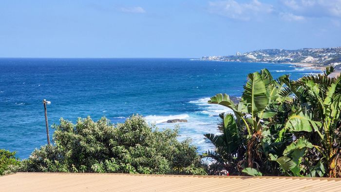 For Sale: Apartment in Sheffield Beach with ocean views, pool access, and garage.