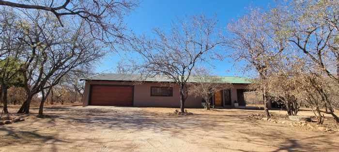 Marloth Park Central House For Sale: Two bedrooms, garage, wildlife views, investment potential.