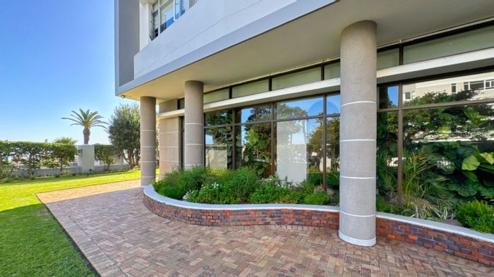 Sea Point Apartment For Sale: Panoramic views, secure parking, steps from promenade.