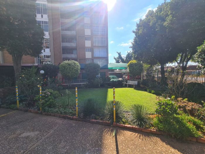 Spacious 2-bedroom apartment in Weavind Park, secure complex, for sale.