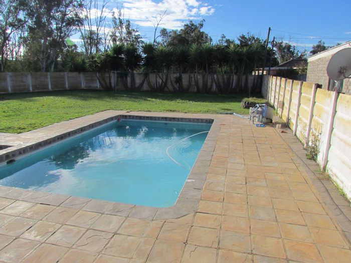 For Sale: Spacious Retief house with pool, triple garage, and unique features.
