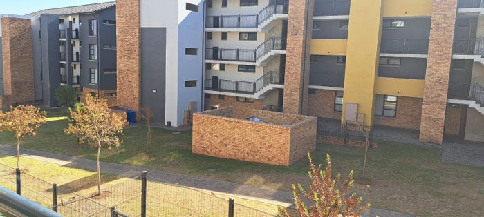 For Sale: Rooihuiskraal North Townhouse with 2 beds, security, and private balcony.