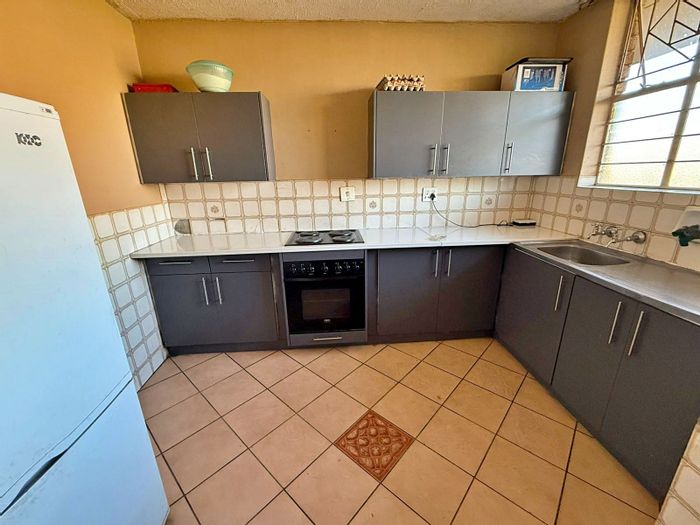4-Bedroom Apartment For Sale in Pretoria Central with Parking and Renovated Features.